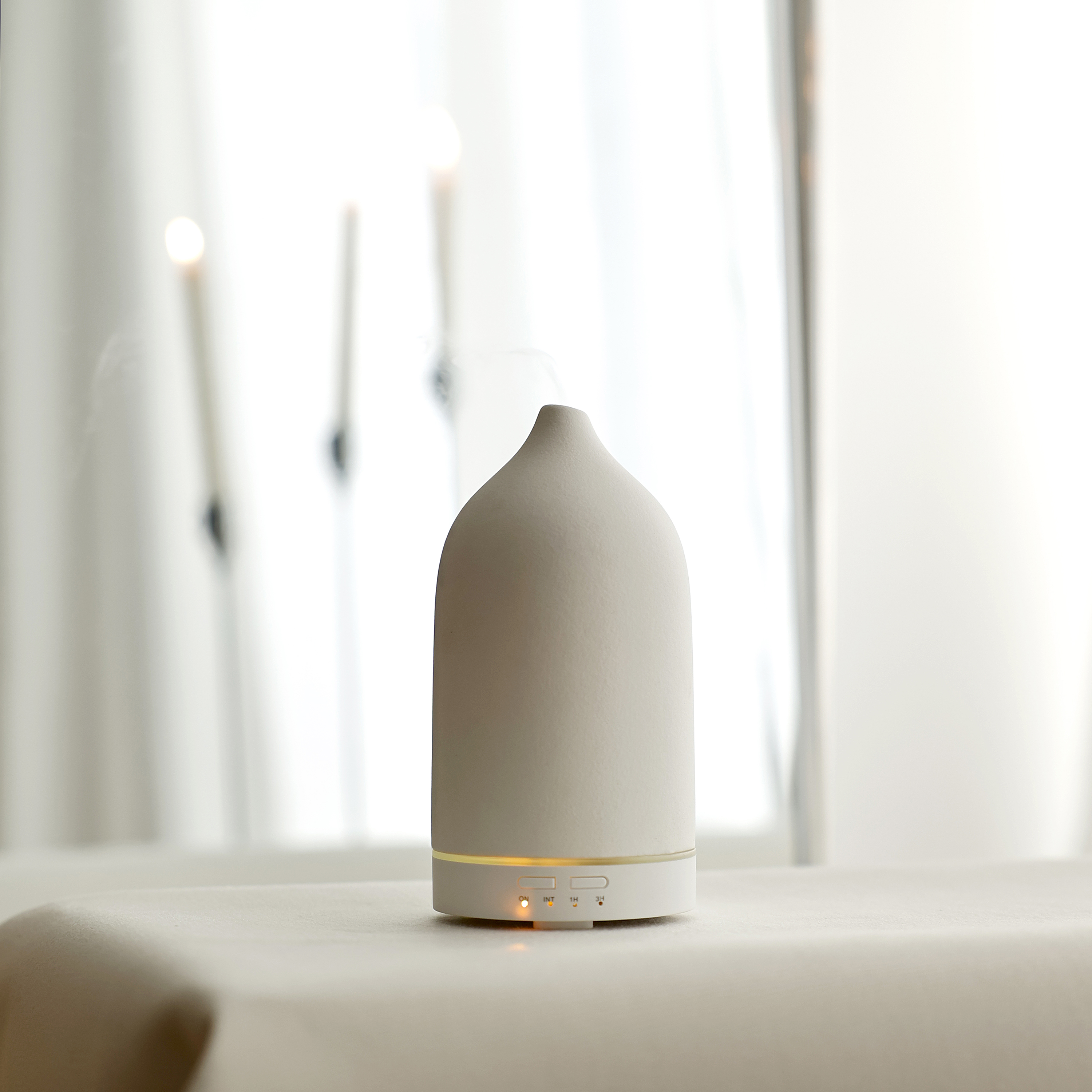 Clay White Ultrasonic Diffuser In living room